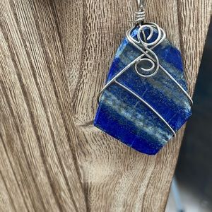 HANDMADE LAPIS LAZULI PENDANT WRAPPED IN STERLING SILVER WIRE